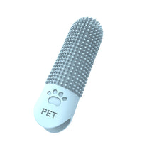 Brushing dog teeth with finger brush — photo 3